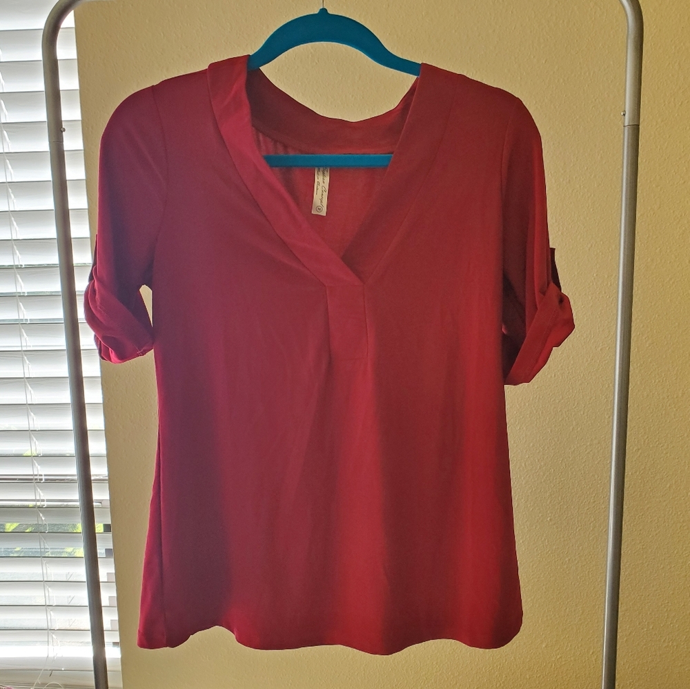 Red blouse gold button detail